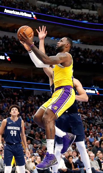 James, Doncic match triple-doubles, Lakers beat Mavs in OT
